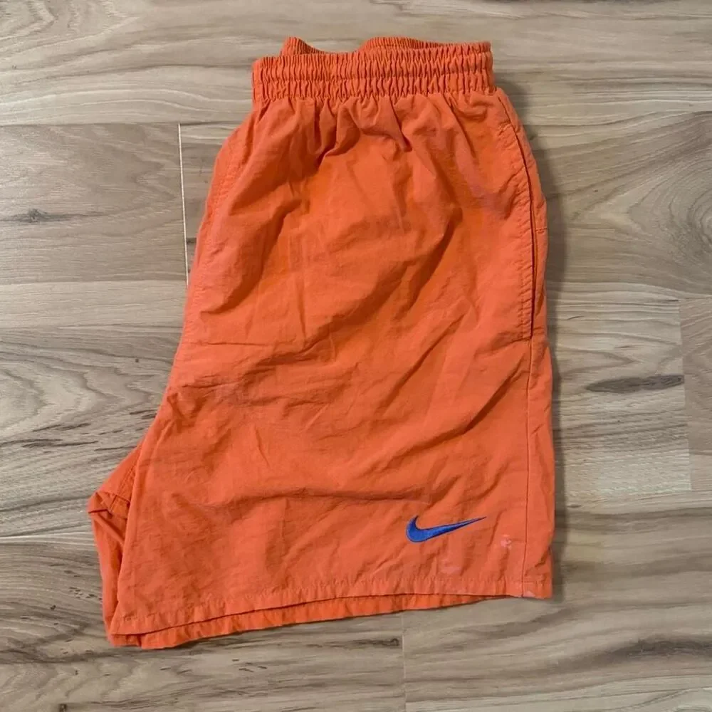 Vintage 90s Nike orange Swim Trunk shorts embroidered blue swoosh Size Large